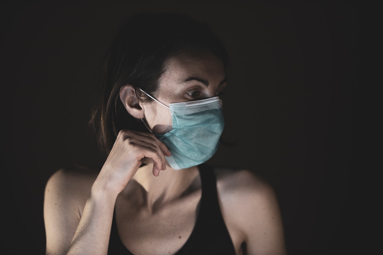 woman wearing a mask